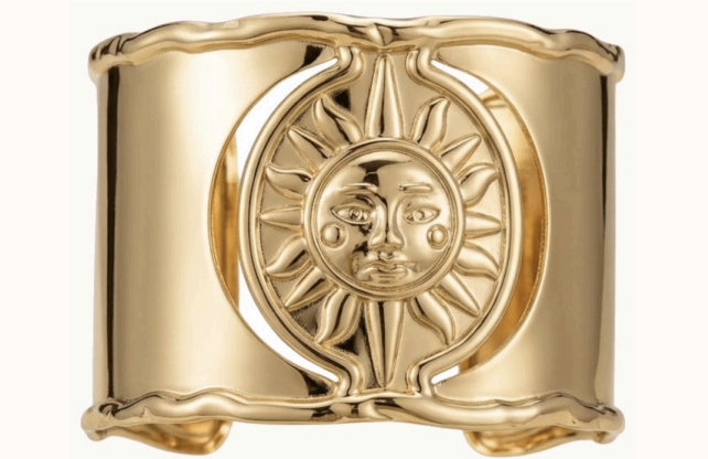Golden Hour sunburst cuff, close view of the medallion and scalloped edges