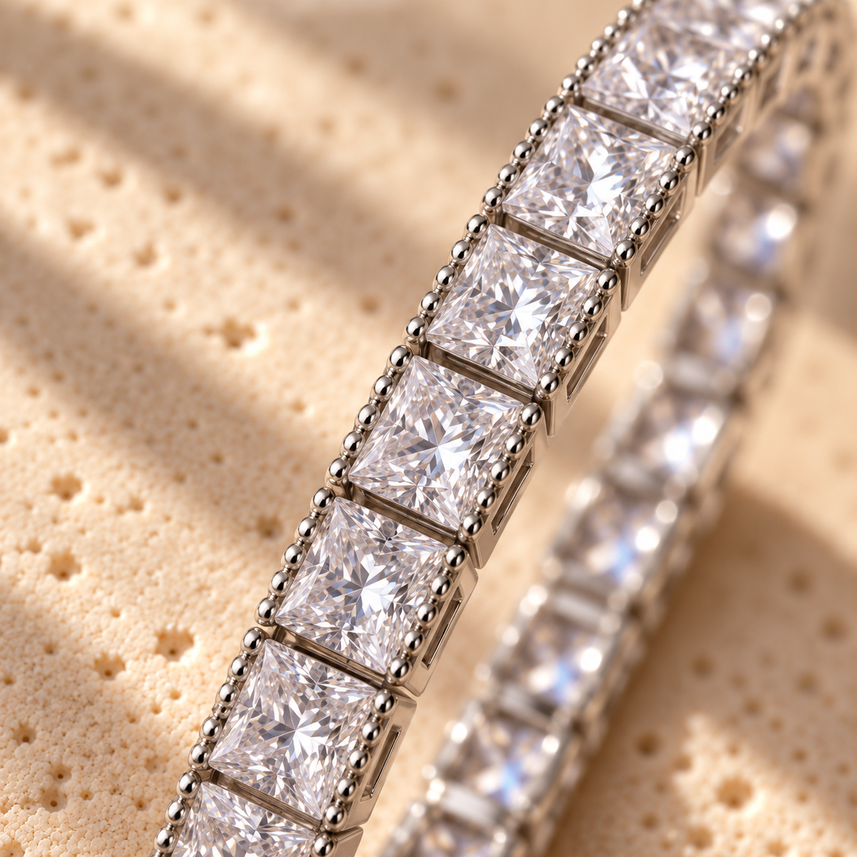 Straight Sets macro close-up: princess-cut stones channel-set between beaded sterling silver rails