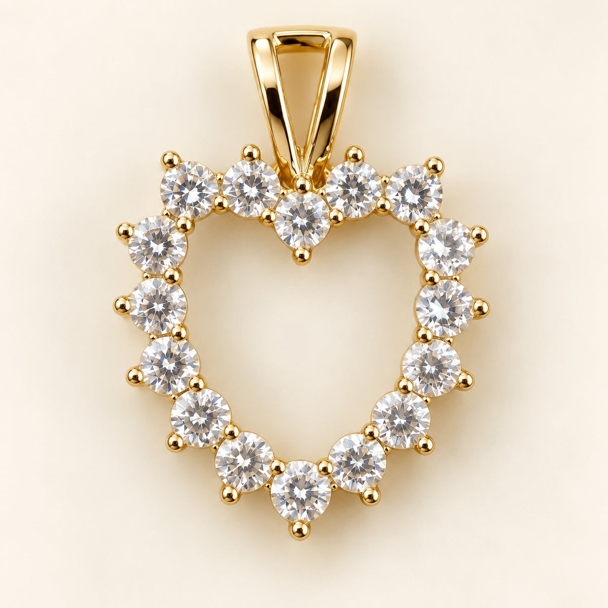 Open Offer single-row gold open-heart pendant outlined in prong-set clear cubic zirconia