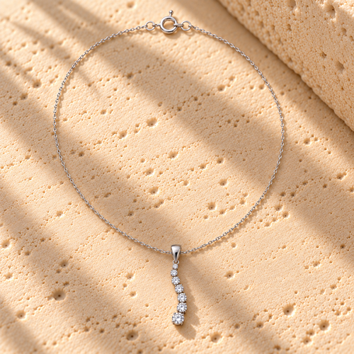 Learning Curve sterling silver graduated journey pendant on its fine sterling silver chain, shown at true size