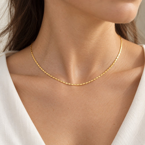 Thin Margin fine 22K gold over S925 sterling silver necklace worn on the neck