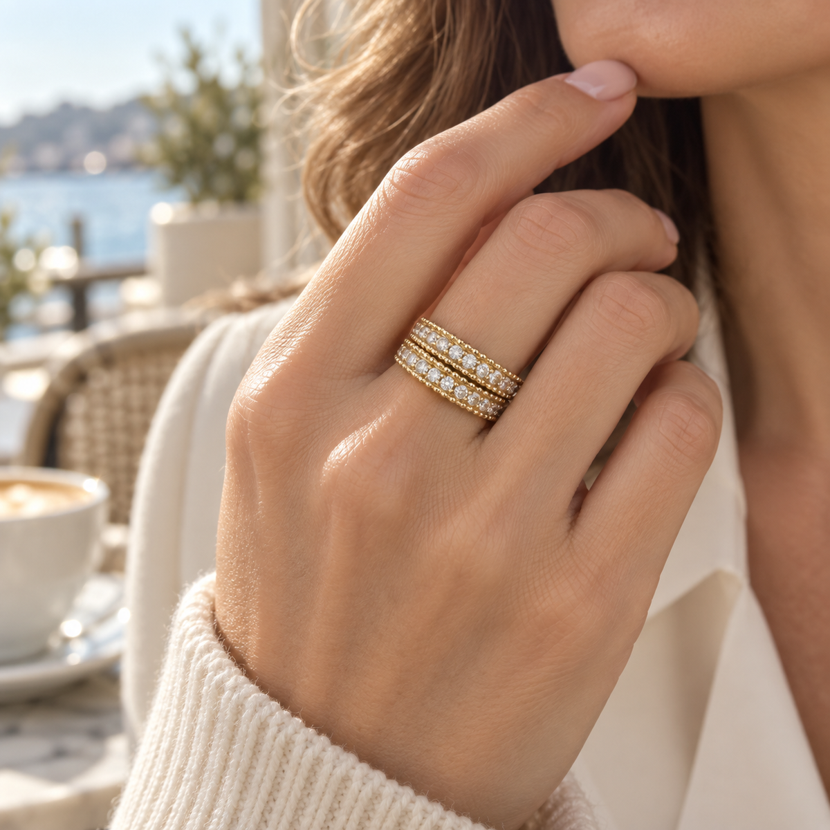 Two White Tie bands stacked on one finger