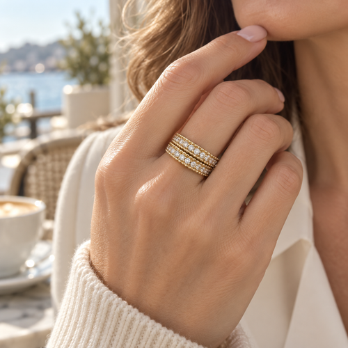 Two White Tie bands stacked on one finger