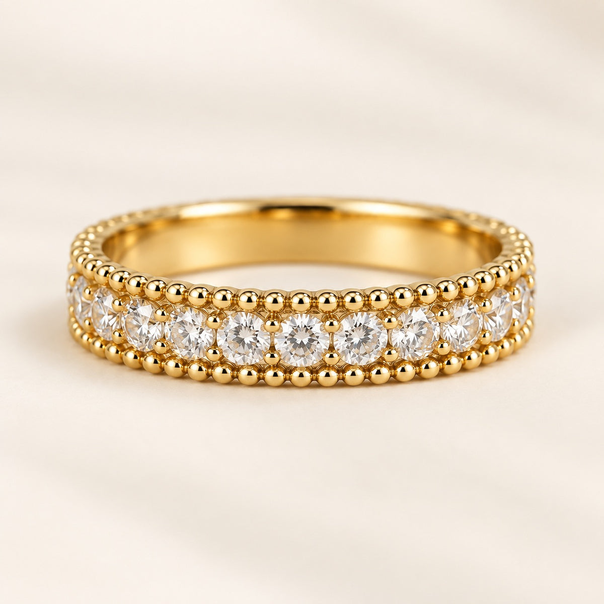 White Tie gold beaded band set with a row of clear cubic zirconia