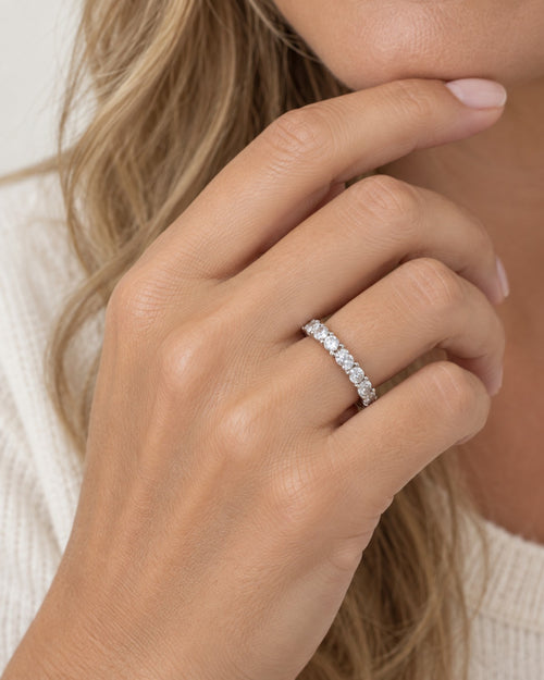 Raise the Stakes sterling silver full eternity ring worn on the hand