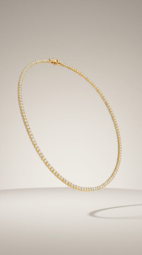 Bar None tennis chain in Clear, gold with simulated diamonds