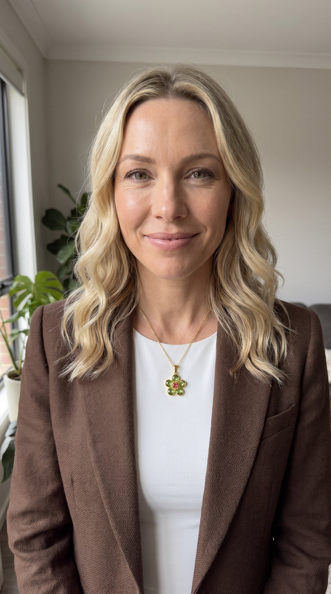 Woman wearing the Boss Up Jewels Late Bloomer necklace