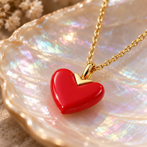 Red Letter Day glossy red heart and gold V-cap, close-up
