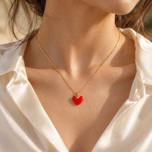 Red Letter Day red heart necklace worn on the collarbone