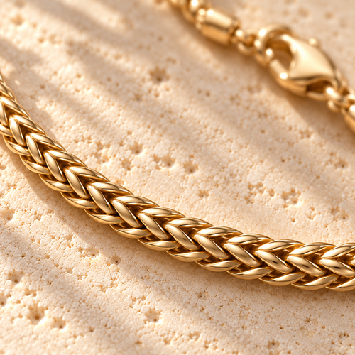 Bar None Gold Wheat Chain macro close-up: braided wheat links with the lobster clasp